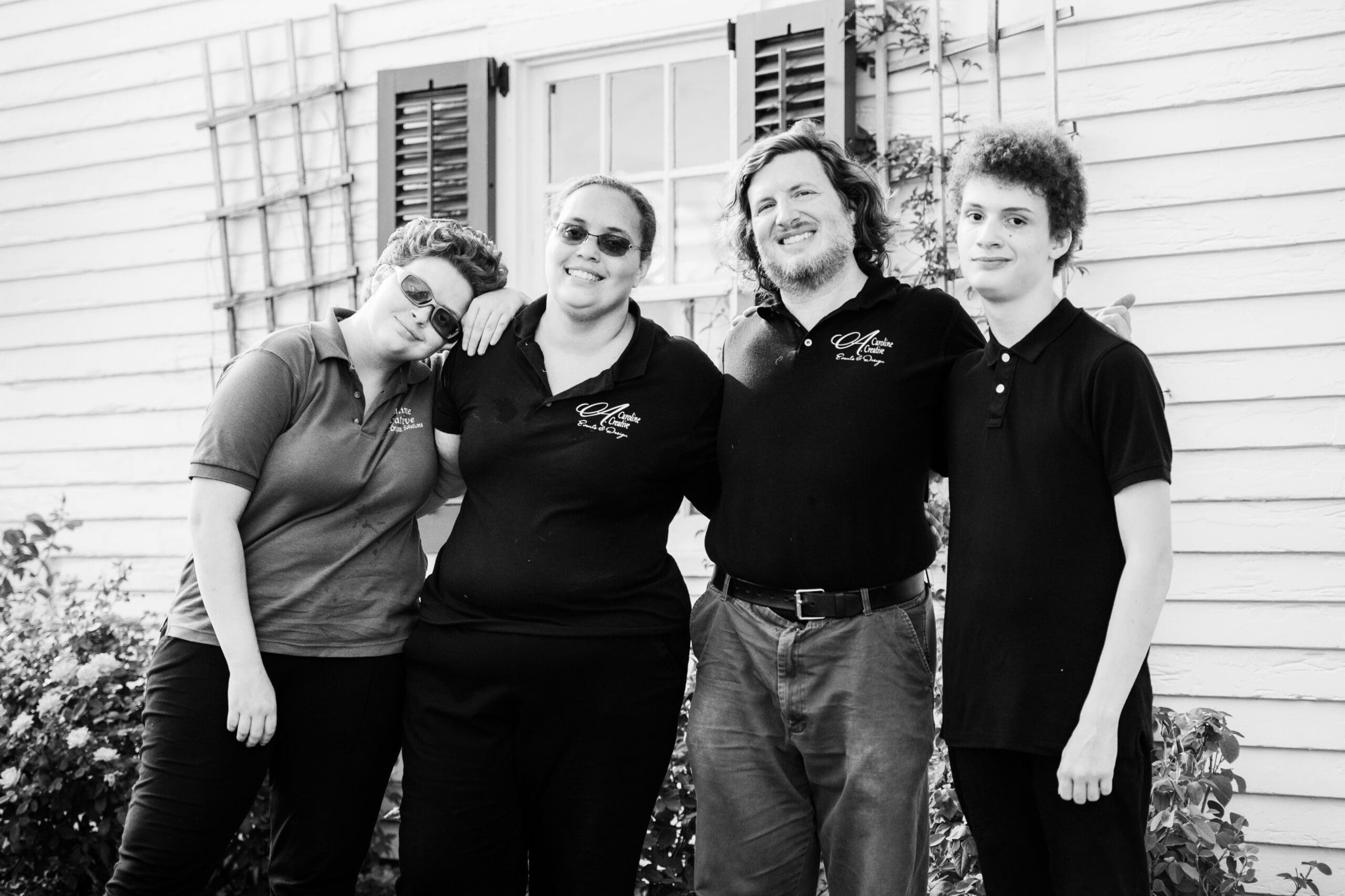 A group of people standing next to each other.