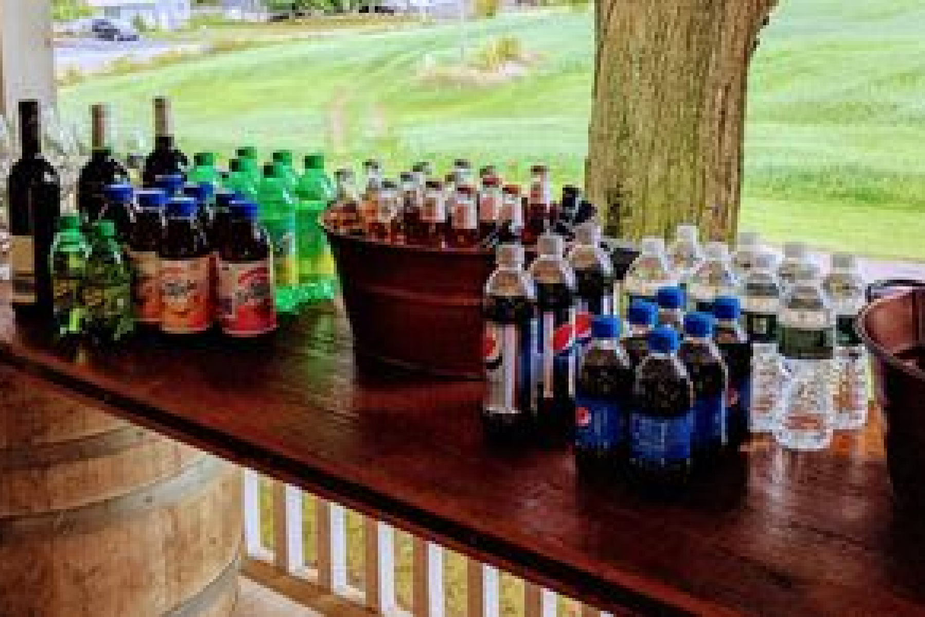 A table with many different drinks on it