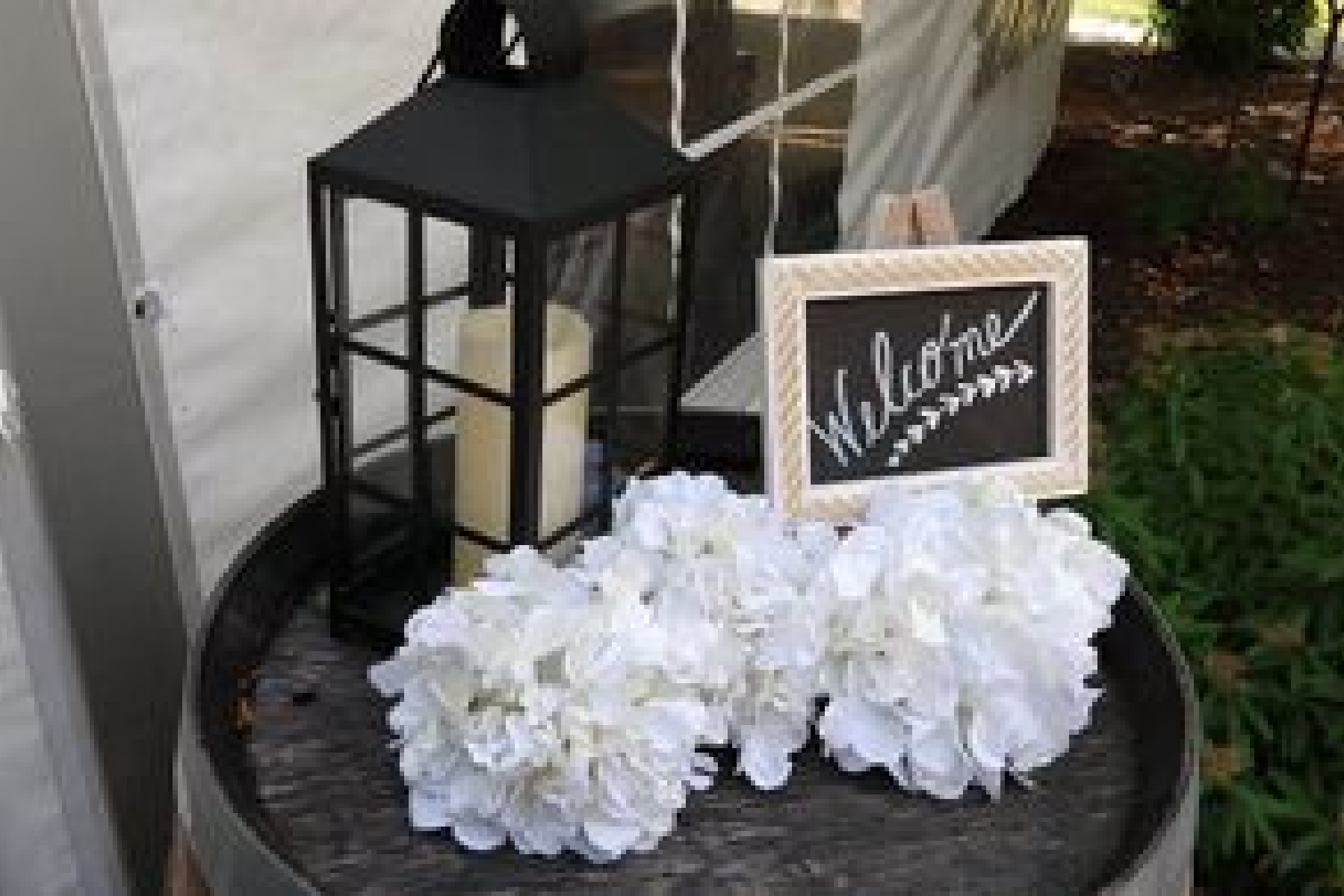 A table with flowers and candles on it
